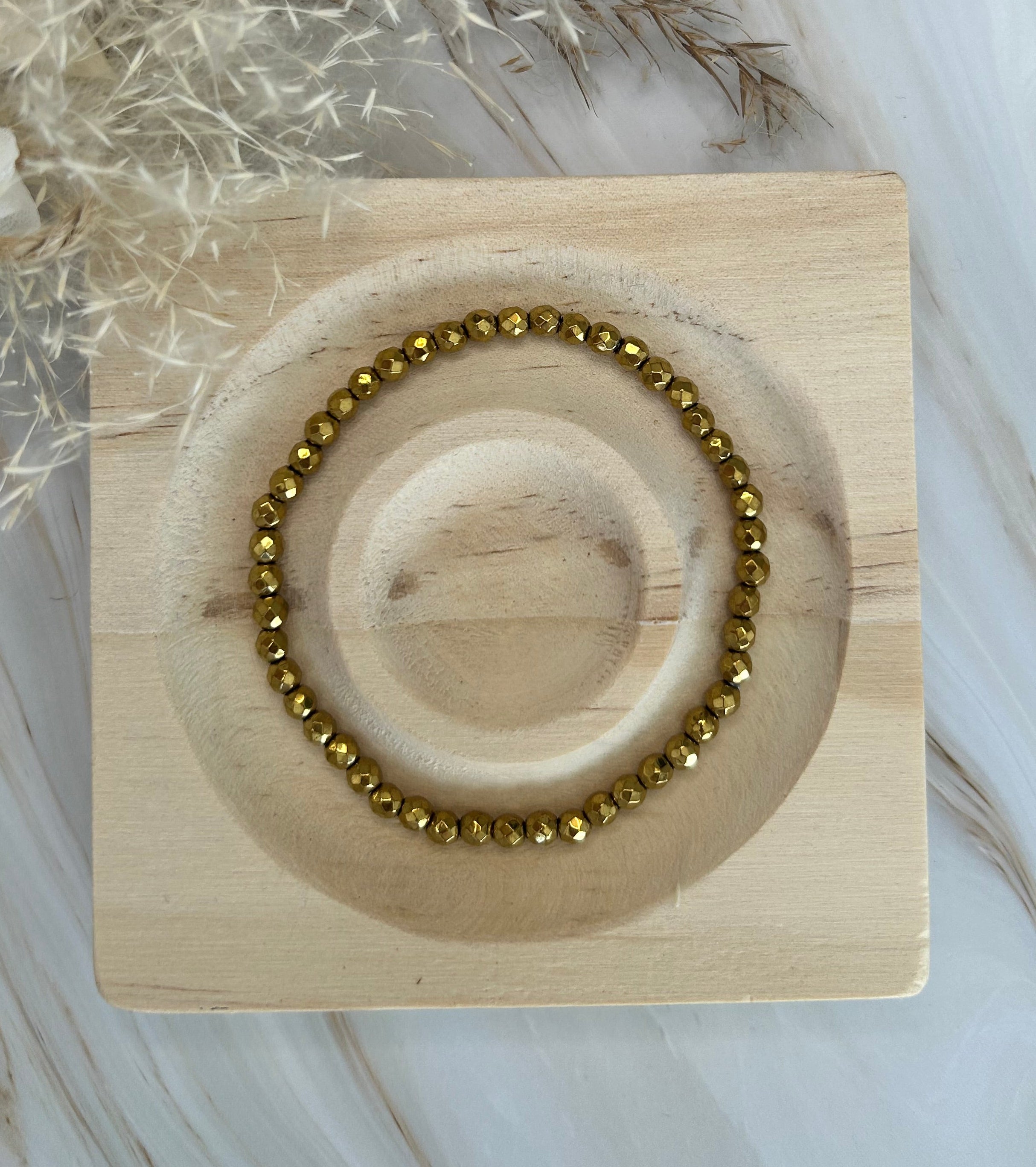 Hämatit Armband gold faccetiert