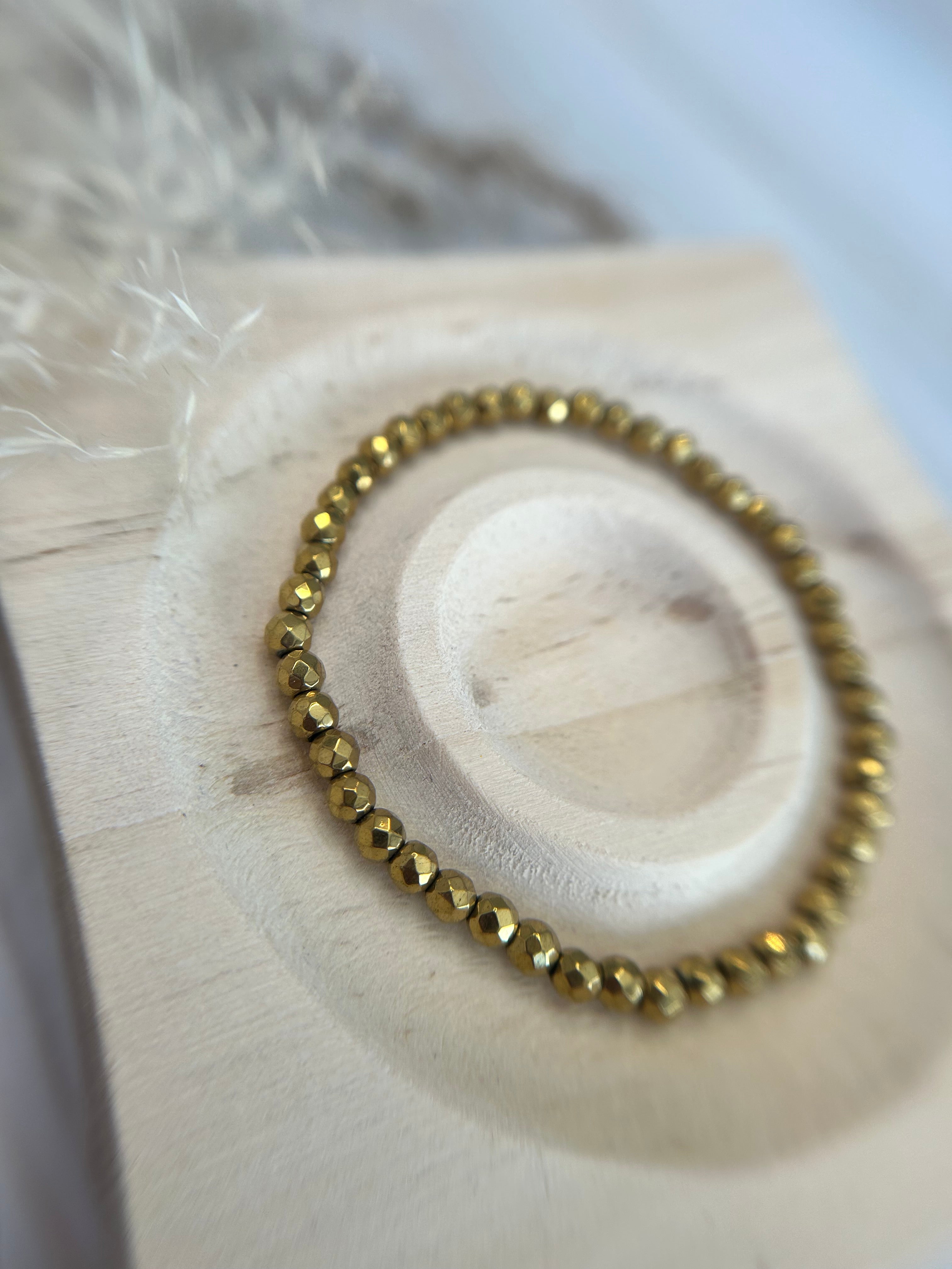 Hämatit Armband gold faccetiert