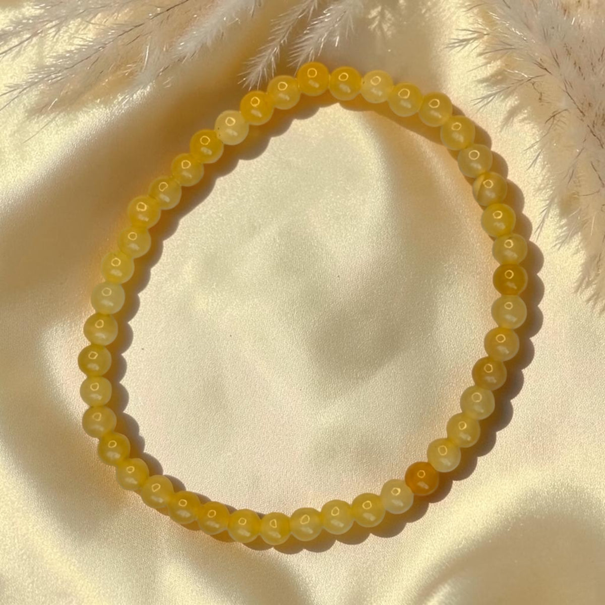 Orangencalcit Armband 4mm