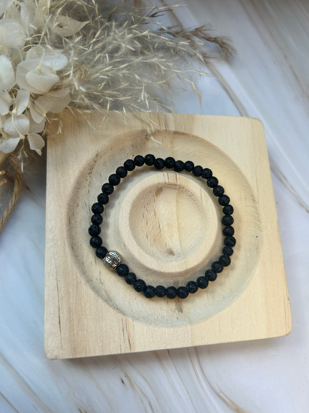 Lavastein mit Buddha Charm