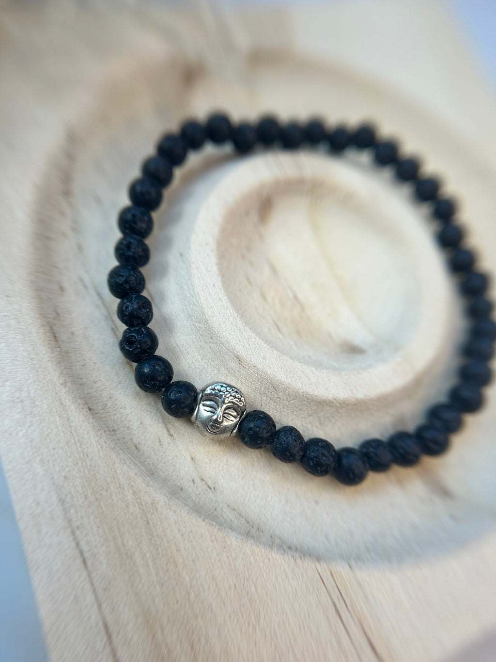 Lavastein mit Buddha Charm