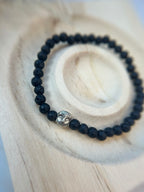 Lavastein mit Buddha Charm